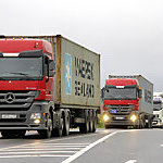 Big traffic jam of trucks on a highway.